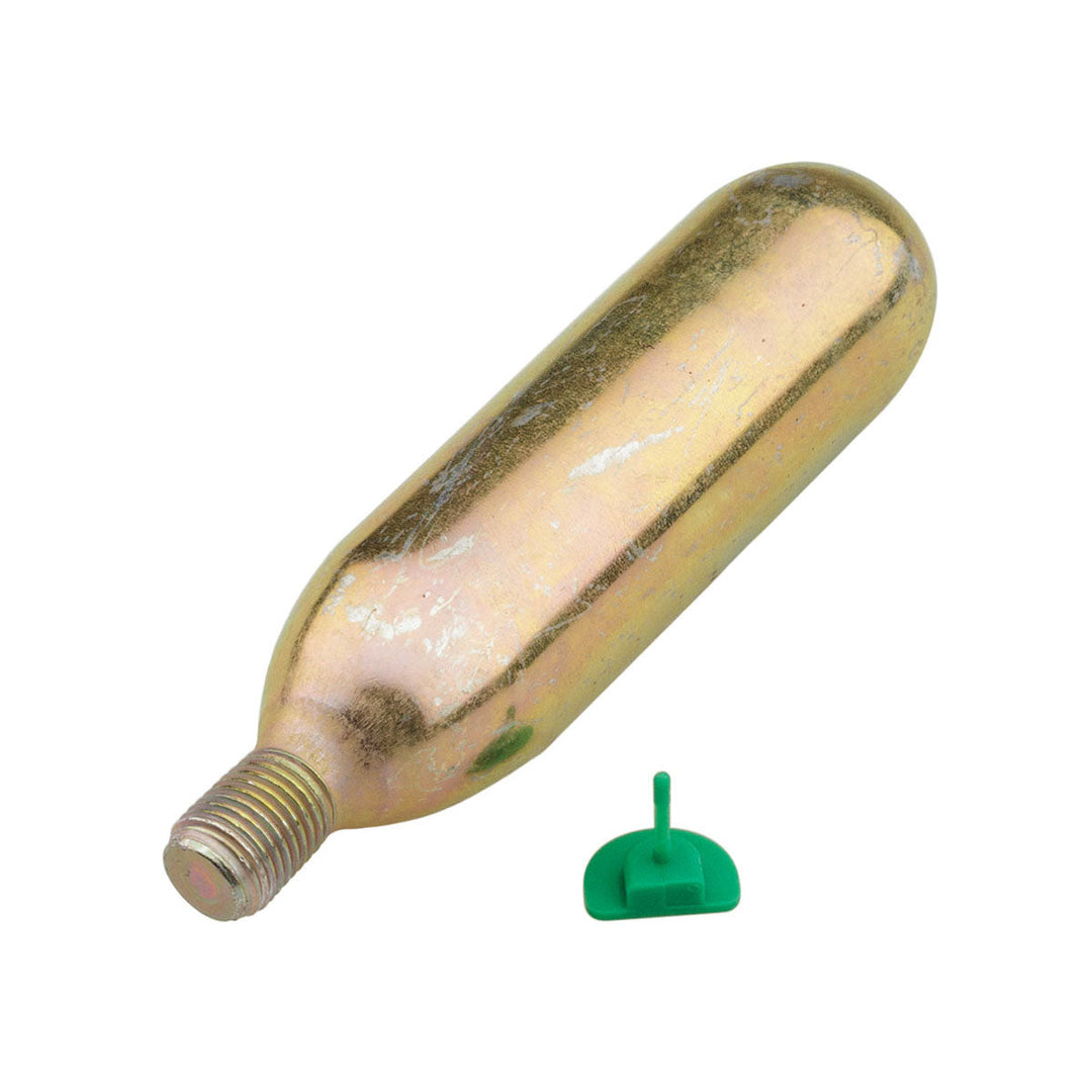 An M-16 Rearming Kit with a small green plastic cap.